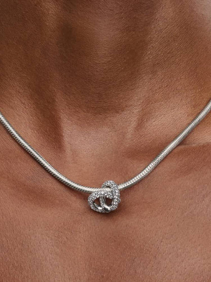Pavé Infinity Knot Heart Charm